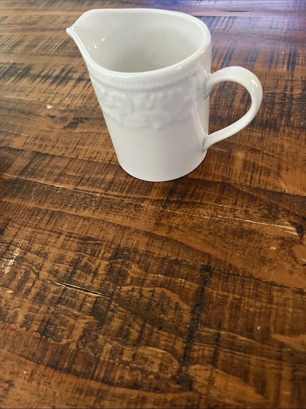 Classic White Ceramic Creamer with Embossed Detail